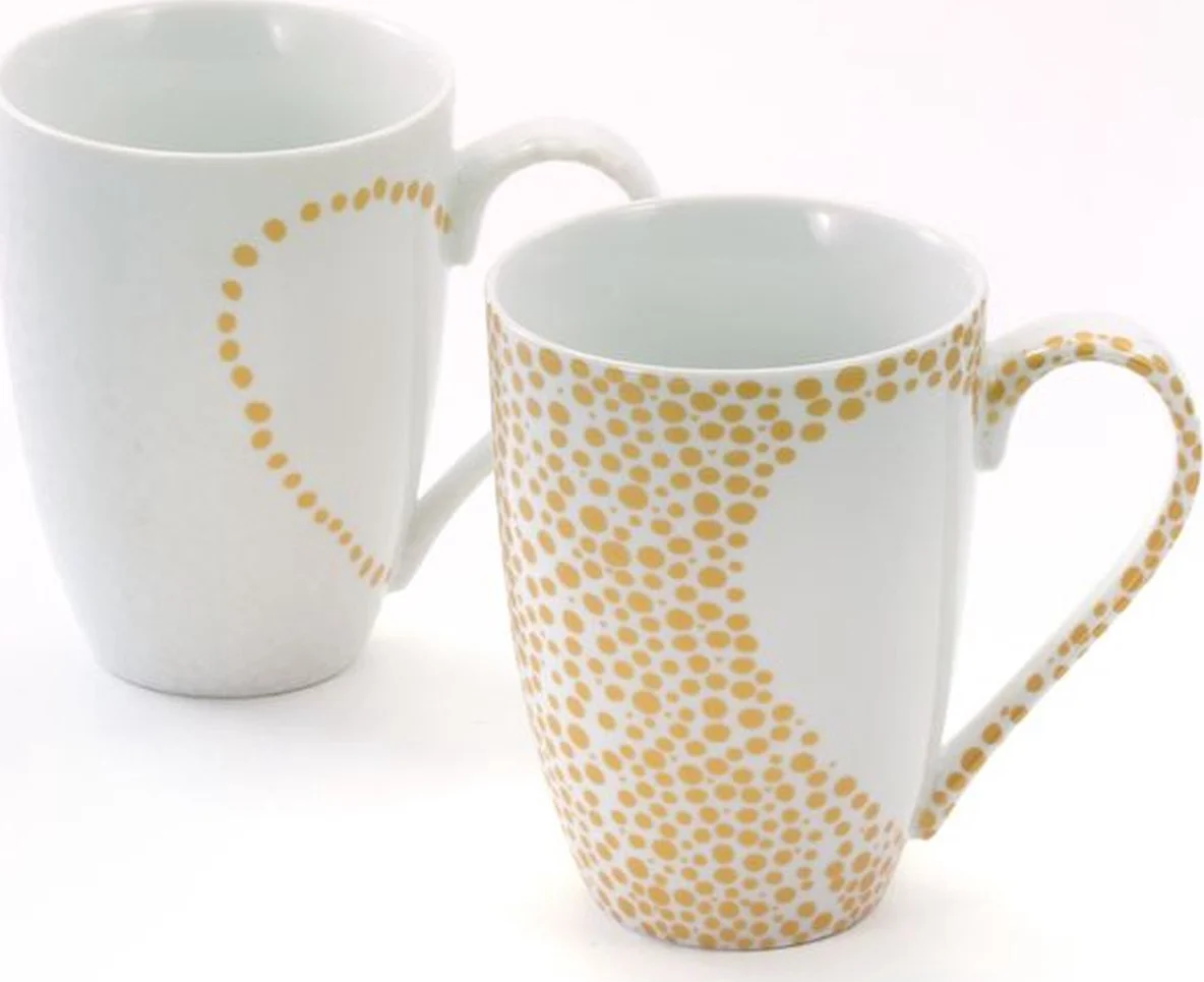 Mokkenset "Vero" - 2 mokken - witte mok met gouden ornamenten en een witte mok met een hart